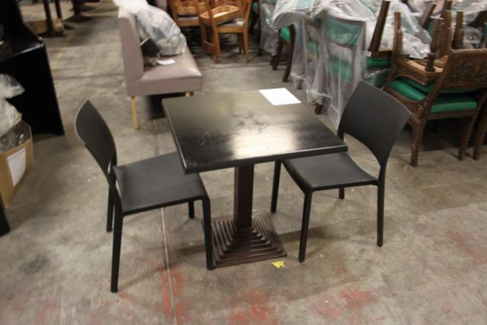 Dining table black Werzalit top with cast metal pedestal base 600mm x 600mm x 740mm