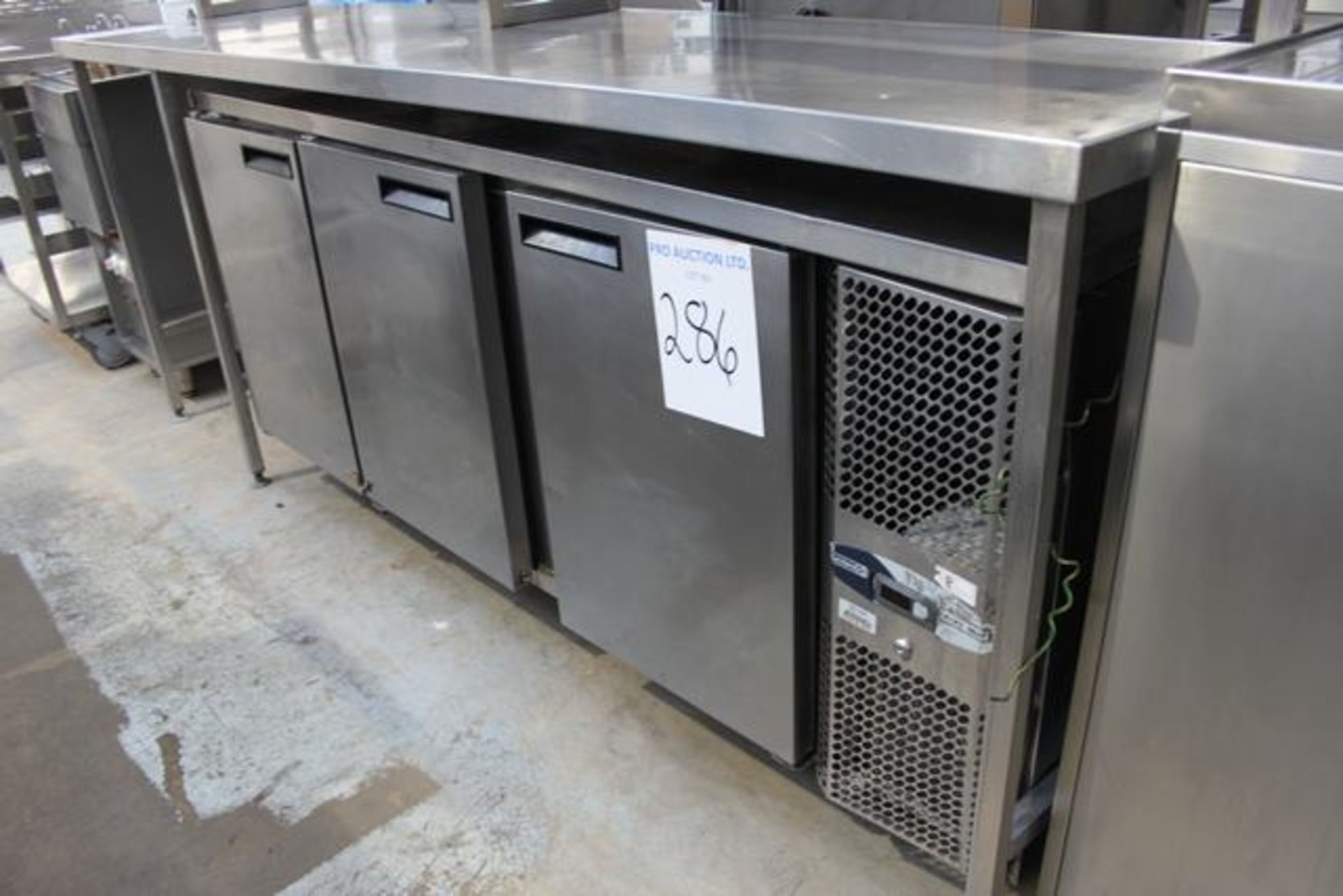 Precision MCU 311SS three door stainless steel refrigerated bench counter temperature range -2/+4