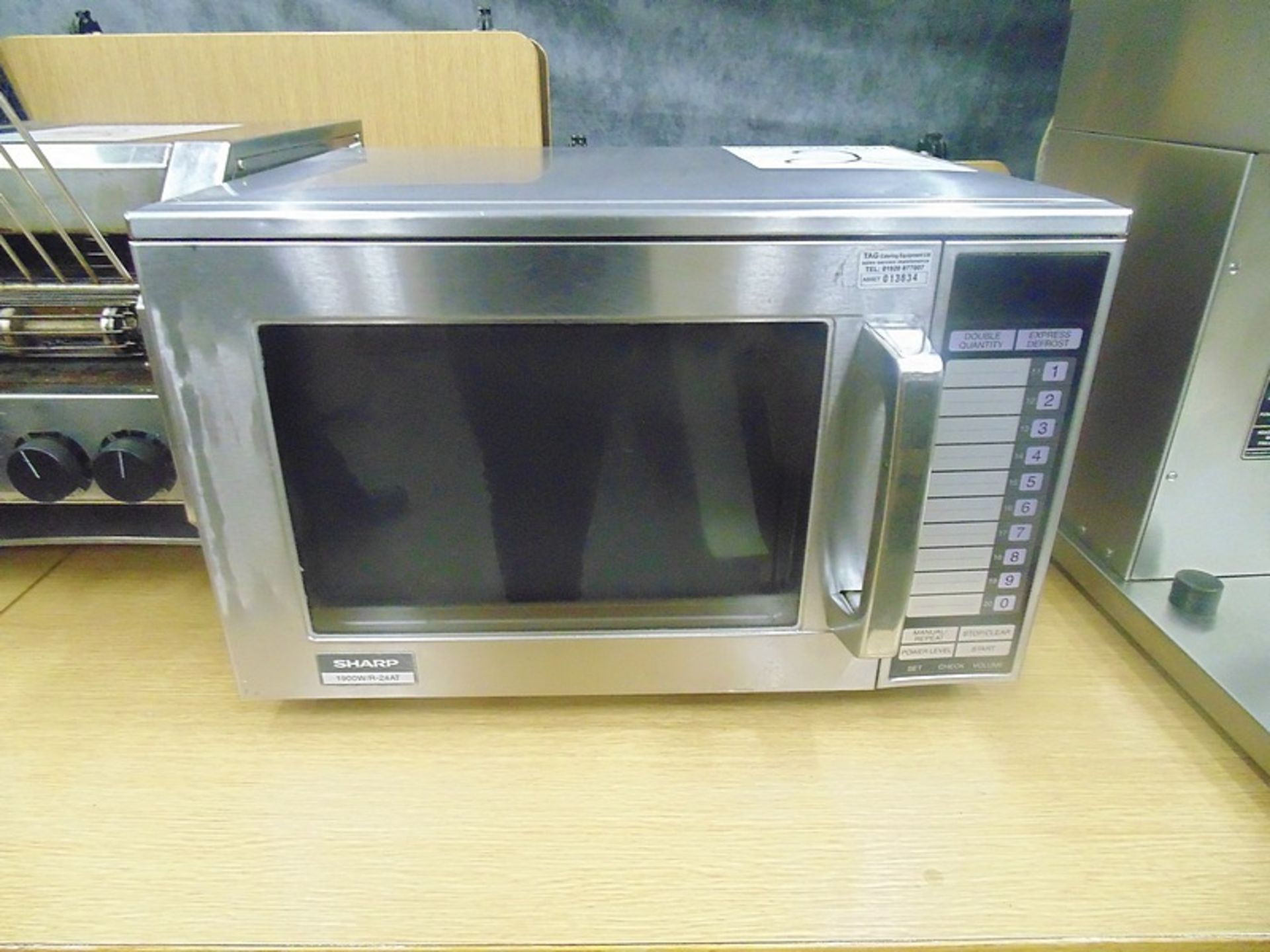 Sharp R24AT stainless steel commercial microwave oven touch controls with 20 pre-sets 11 power