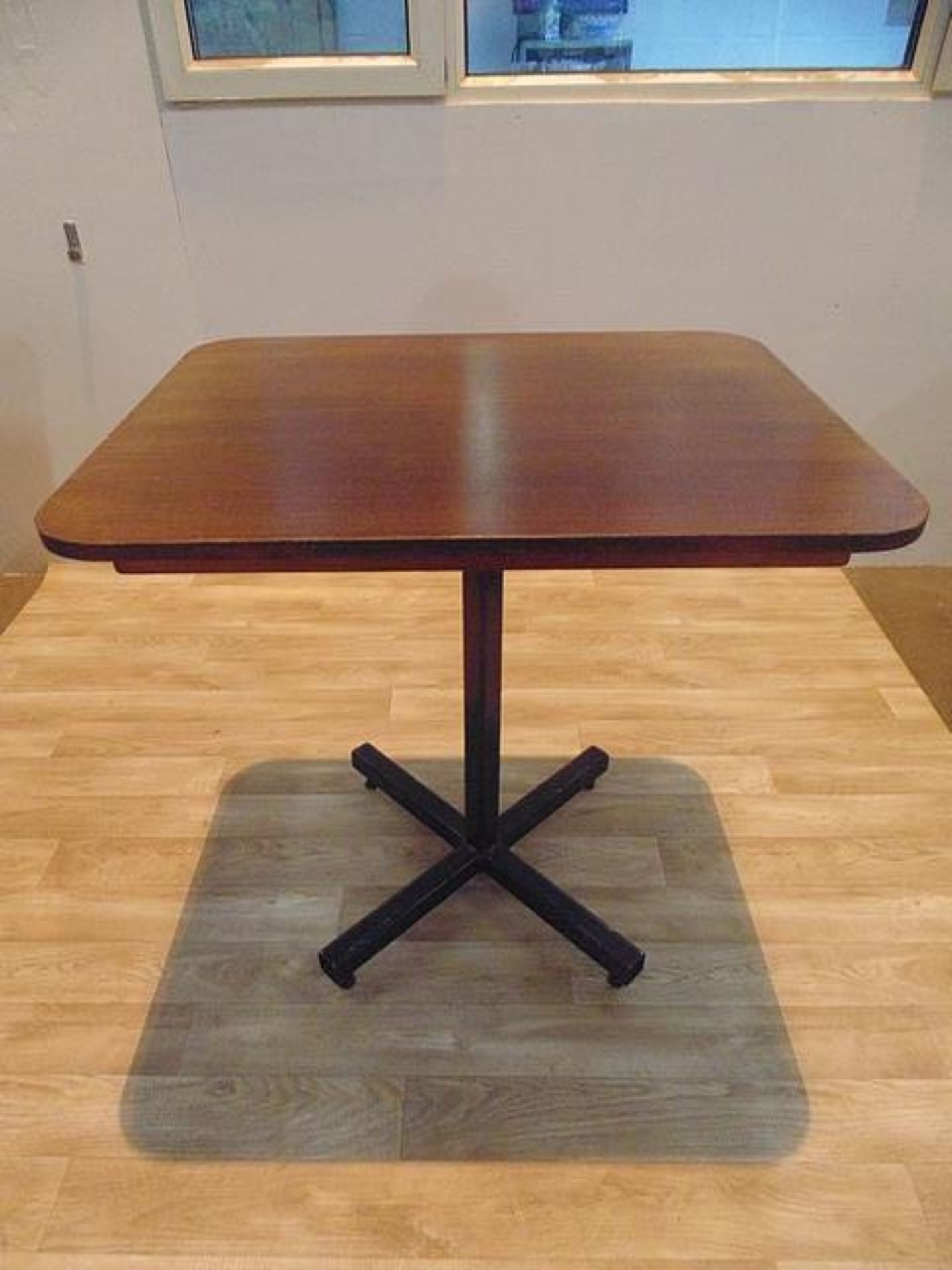 Dark wooden dining table on metal frame 660mm x 610mm x 760mm
