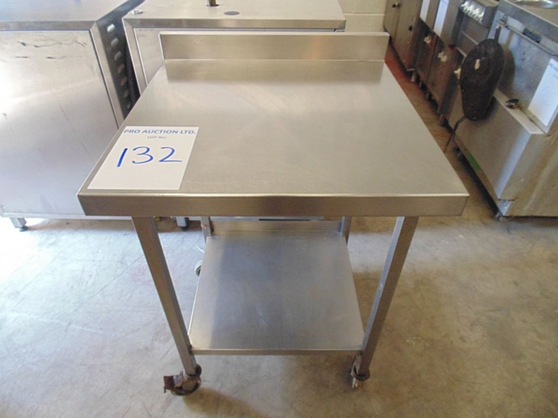 Stainless steel mobile preparation table with upstand and shelf 650mm x 650mm x 870mm