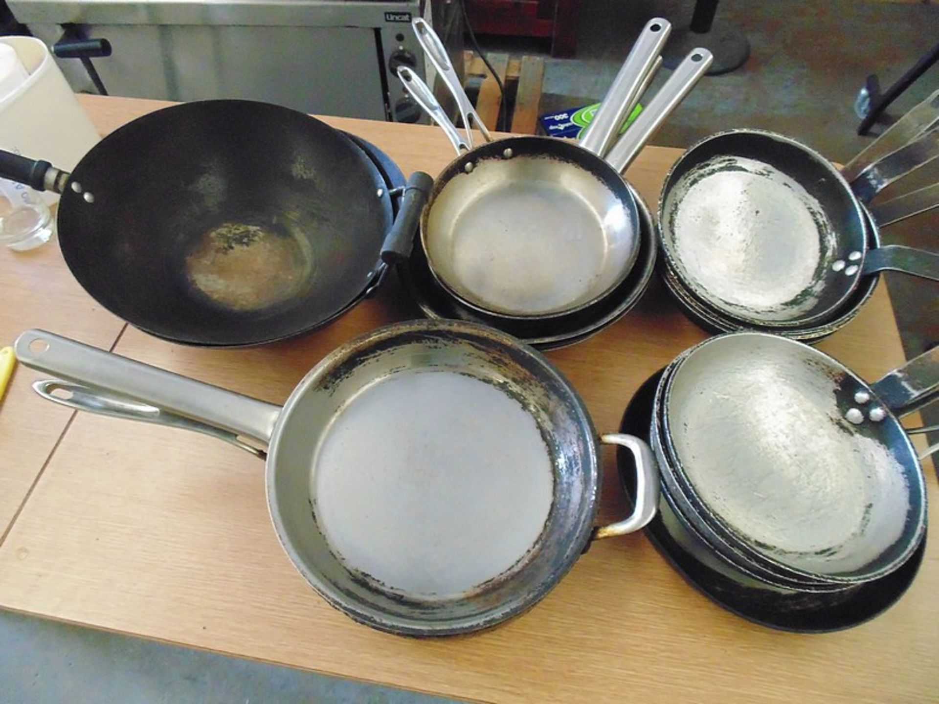 15 x various frying pans and 2 x WOK pans