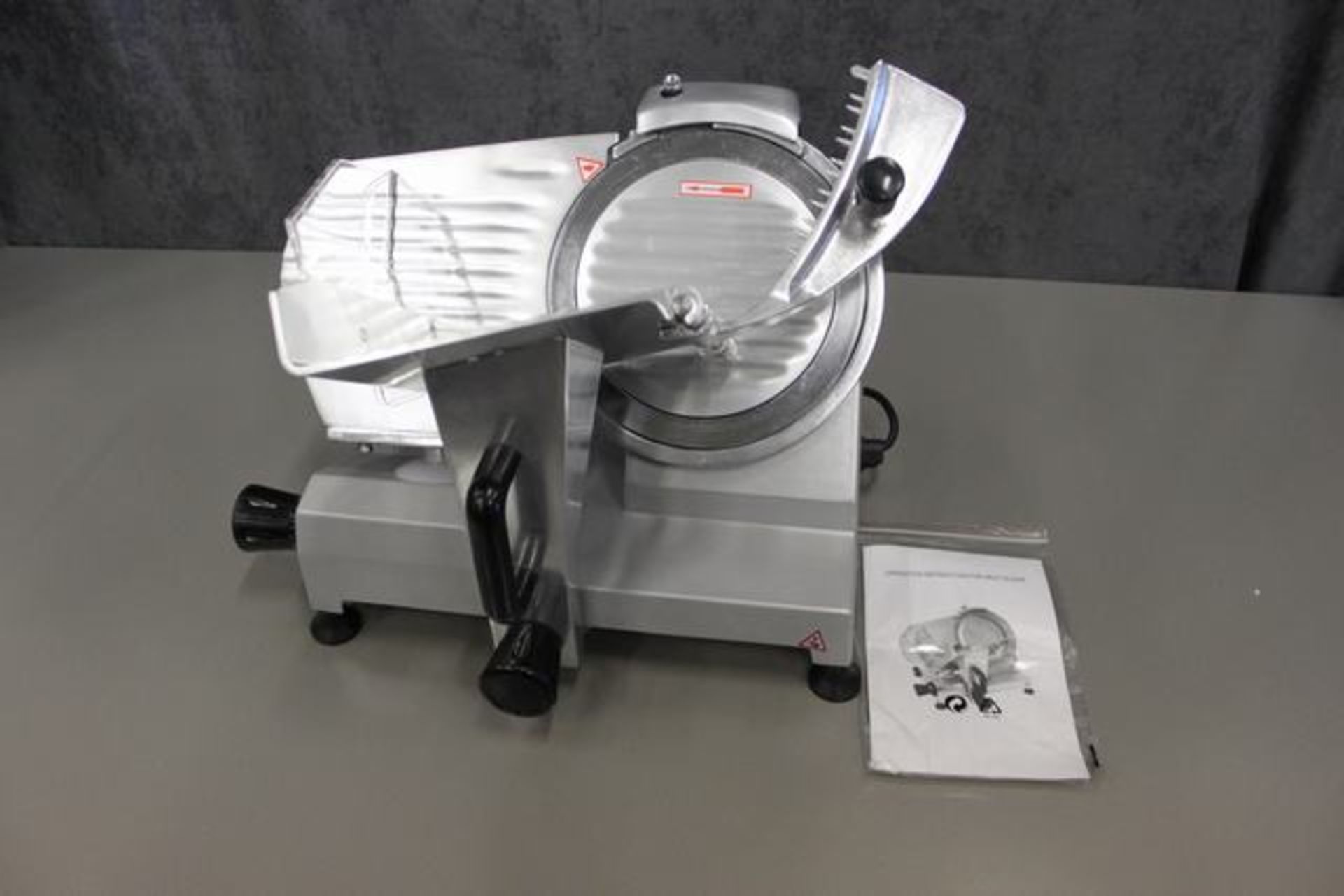 Gravity 220S Automatic Meat Slicer - a high quality gravity feed slicer with a chromed steel blade