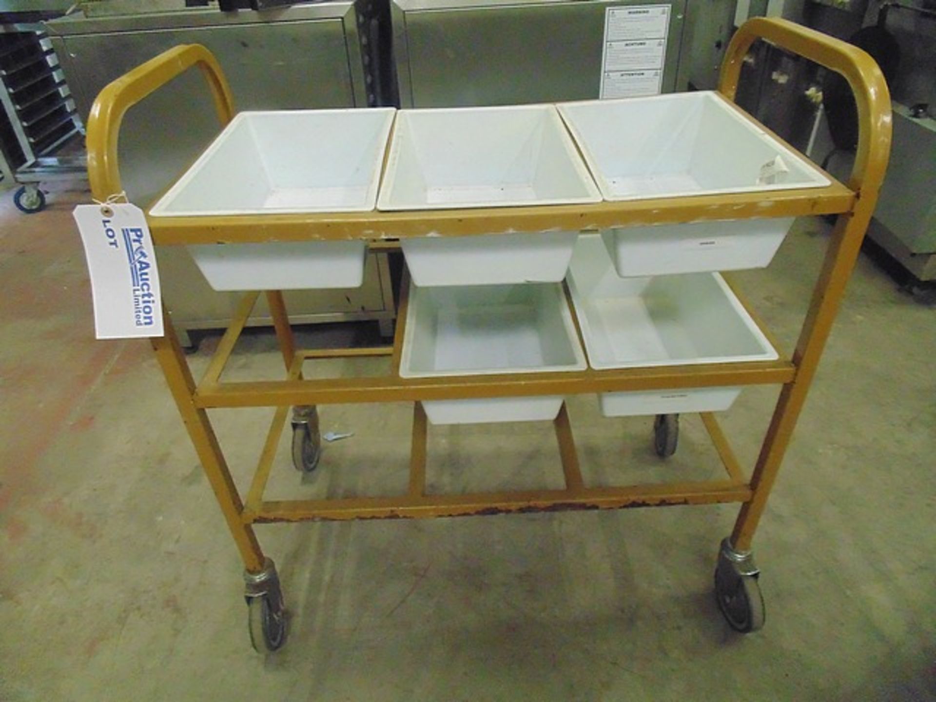 Mobile heavy duty three tier trolley the trolley has slotted compartments on each tier 900mm x 460mm