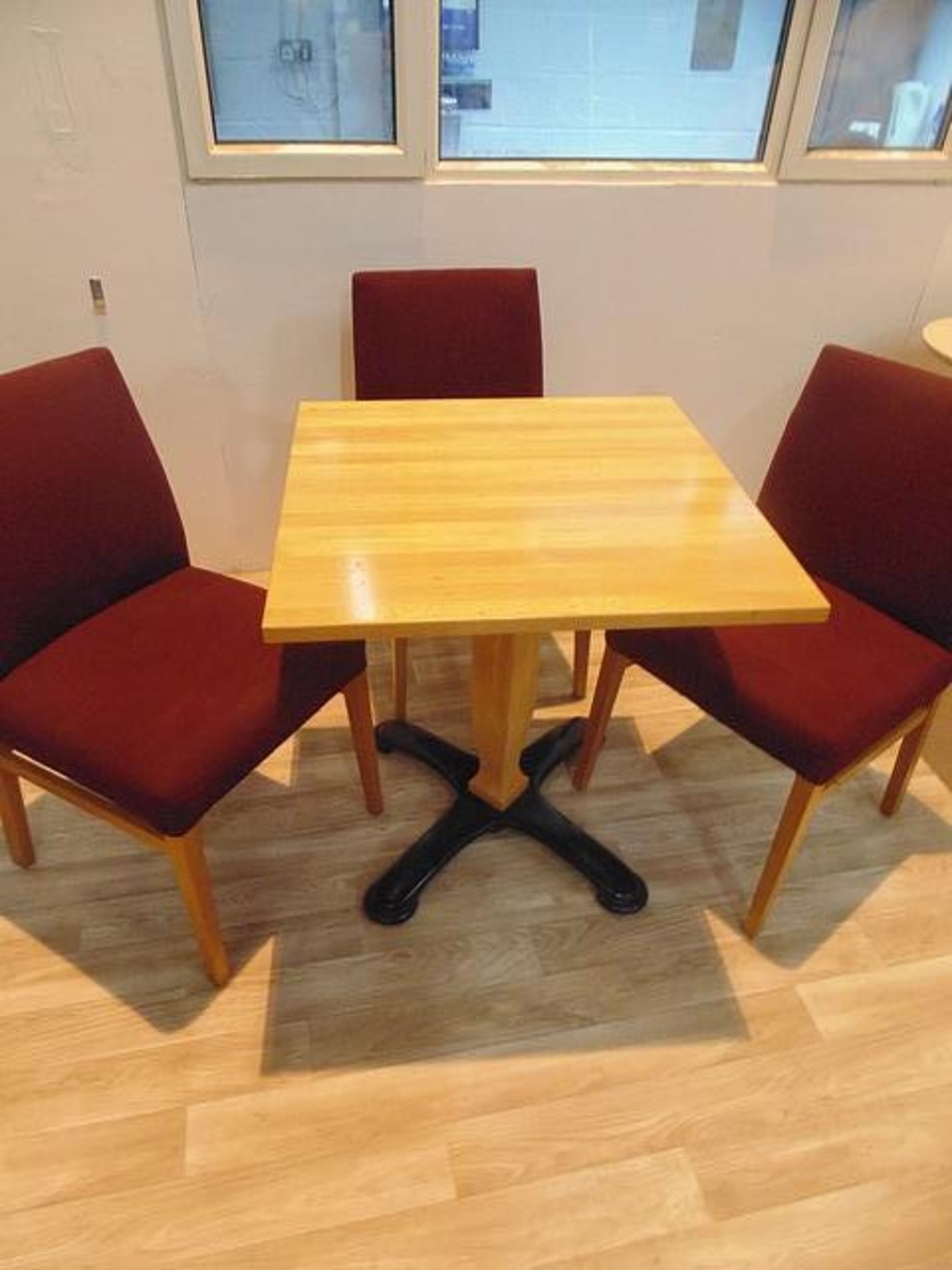 Wooden square dining table with wooden pedestal complete with three upholstered side chairs 700mmx