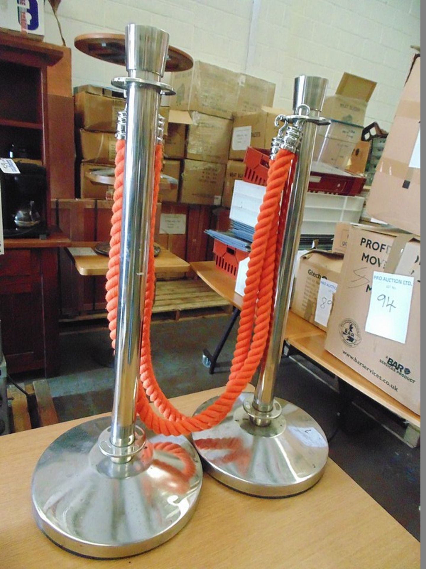 A pair of stainless steel 870mm tall rope barriers