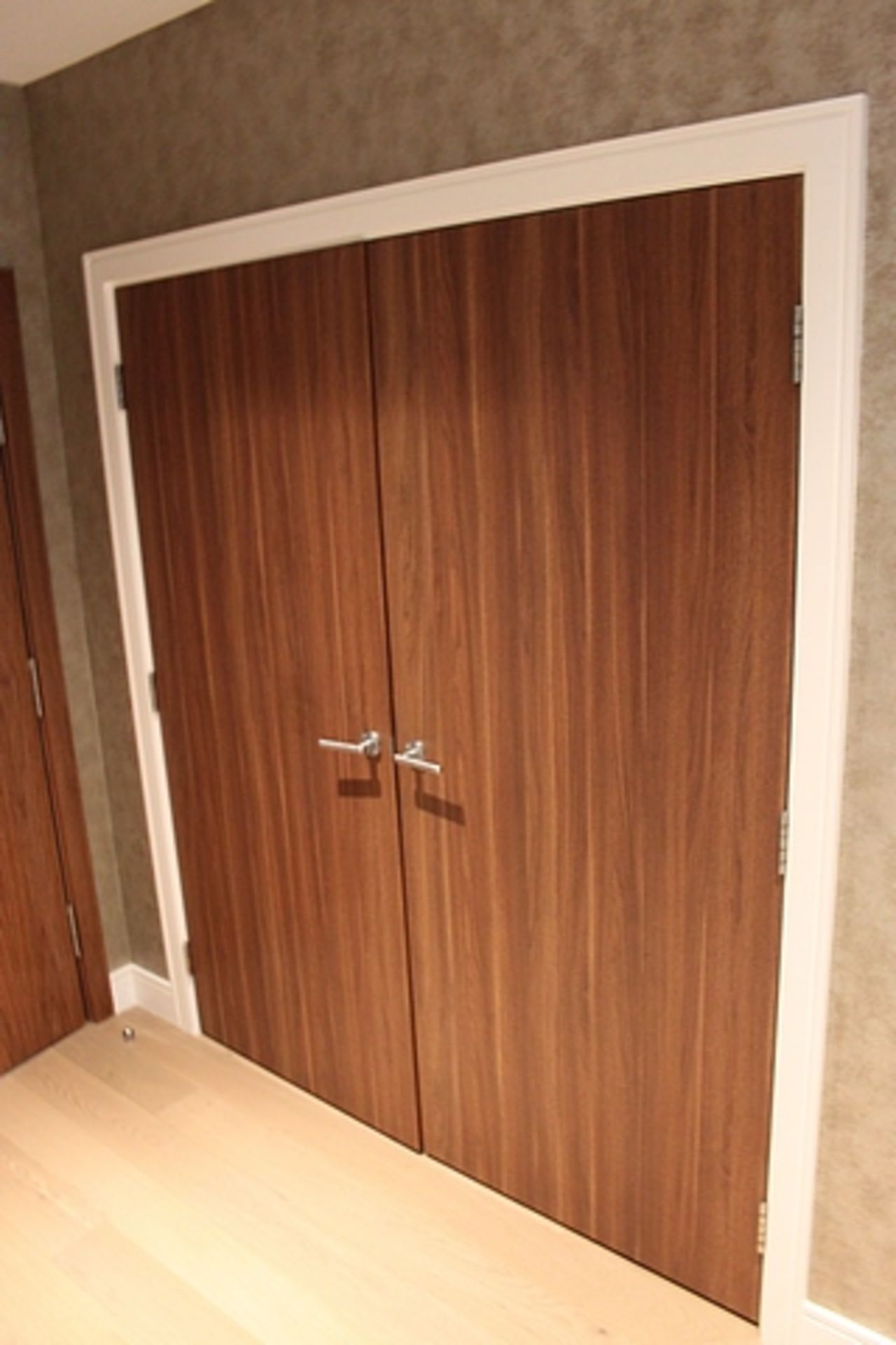 A pair of oak effect cupboard doors each being 680mm x 1980mm