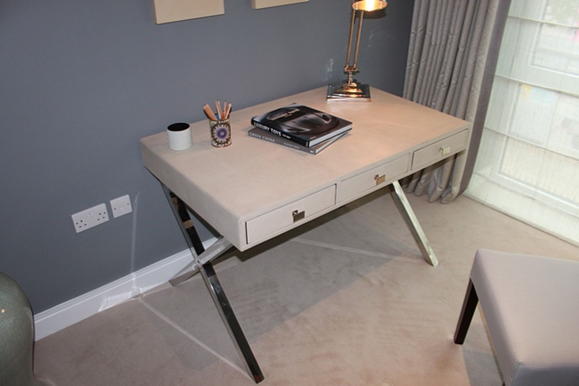 A three drawer writing desk stainless frame 1200mm x 760mm