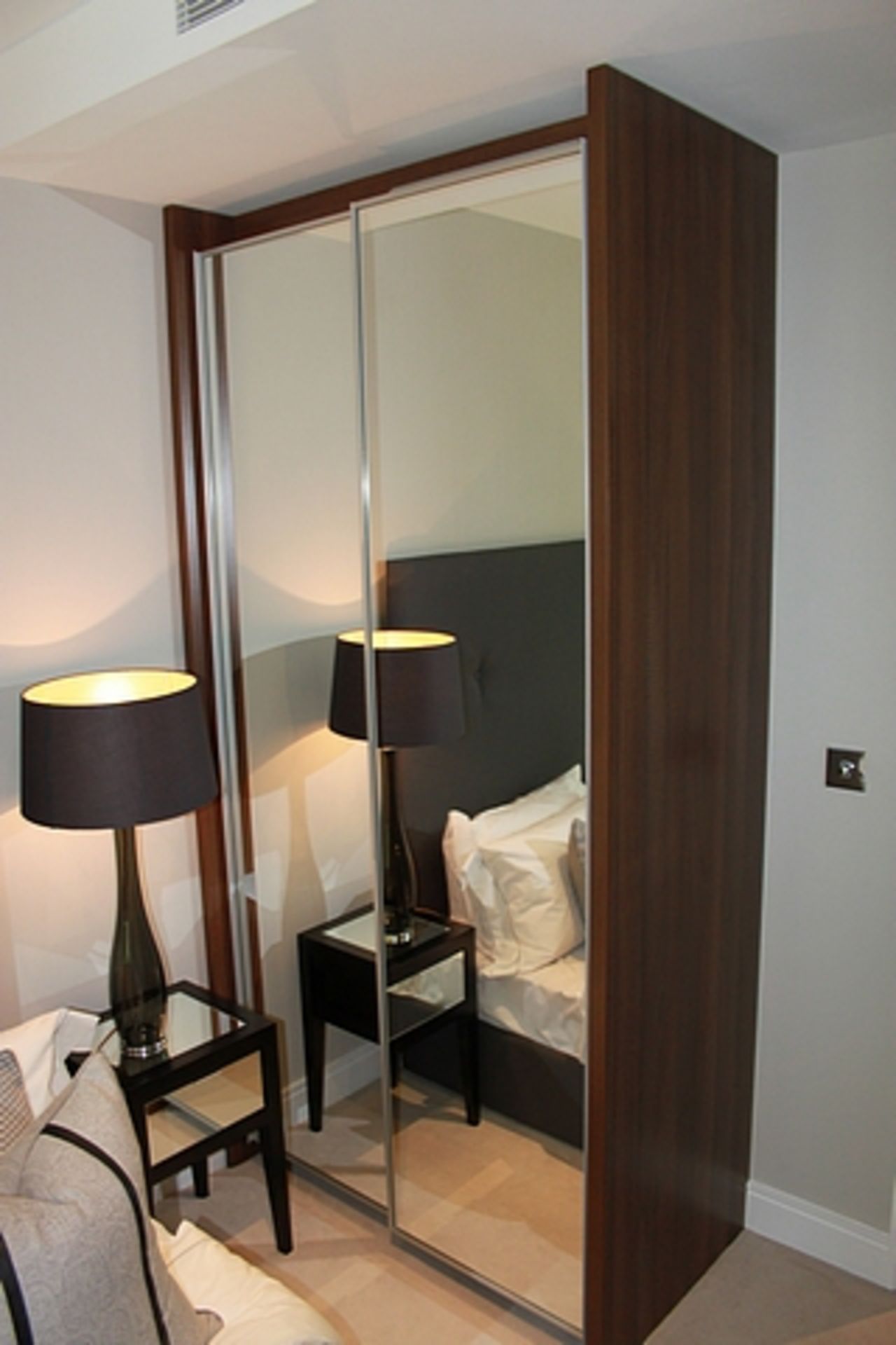 Double mirrored sliding door wardrobe internally fitted with illumination 1500mm x 640mm x 2530mm