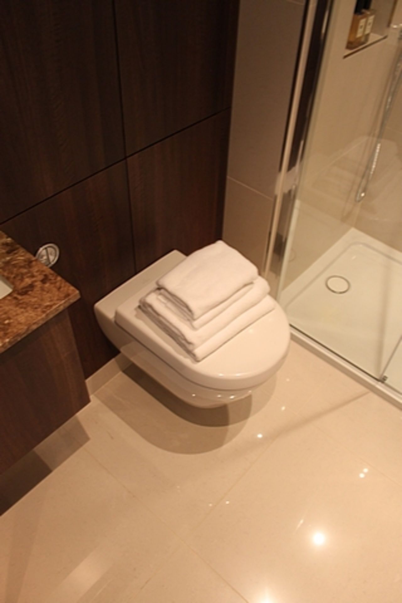 A Villeroy & Boch bathroom suite comprising of stone basin and vanity, WC pan, walk in shower and - Image 2 of 4