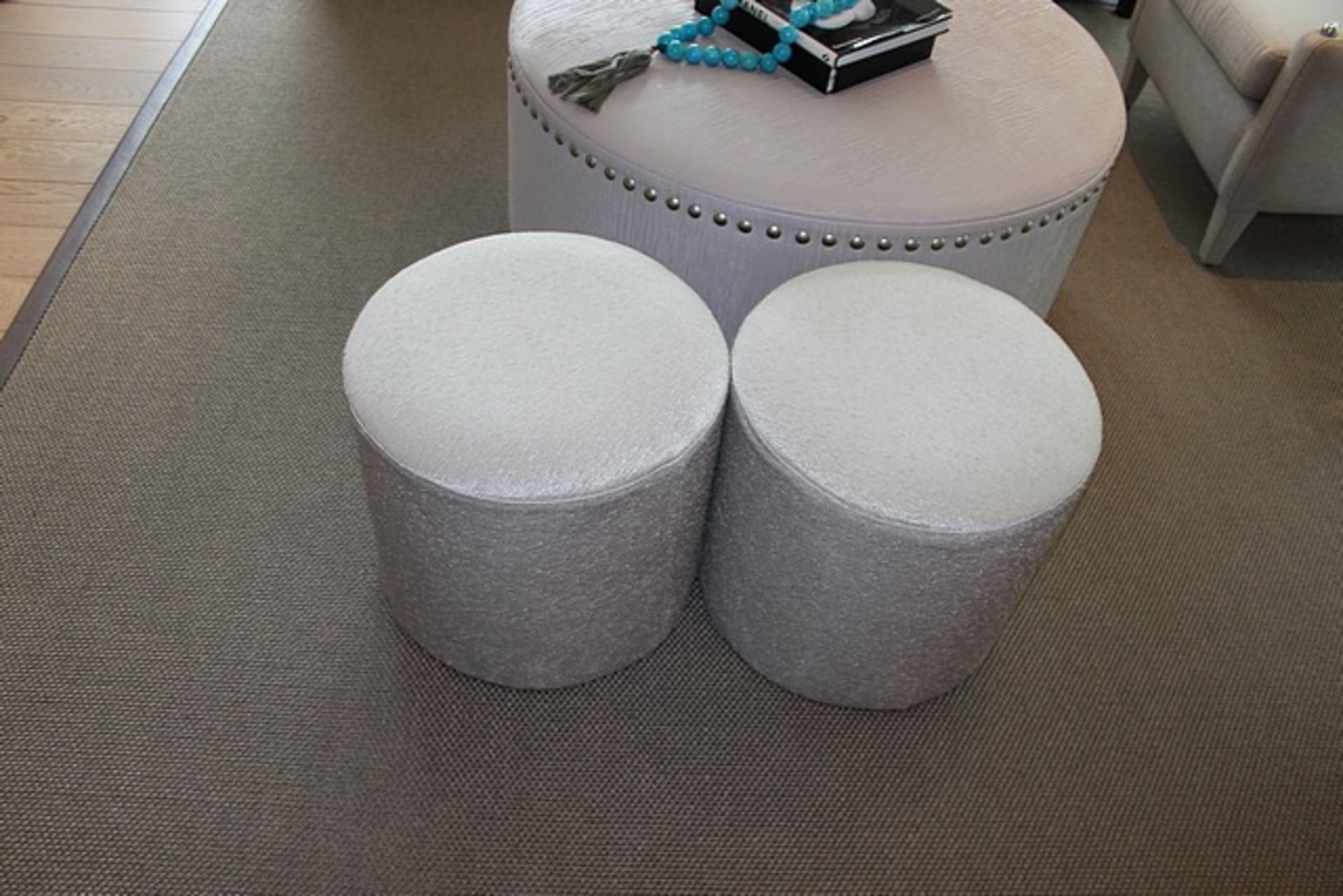 A pair of upholstered stools 450mm x 410mm