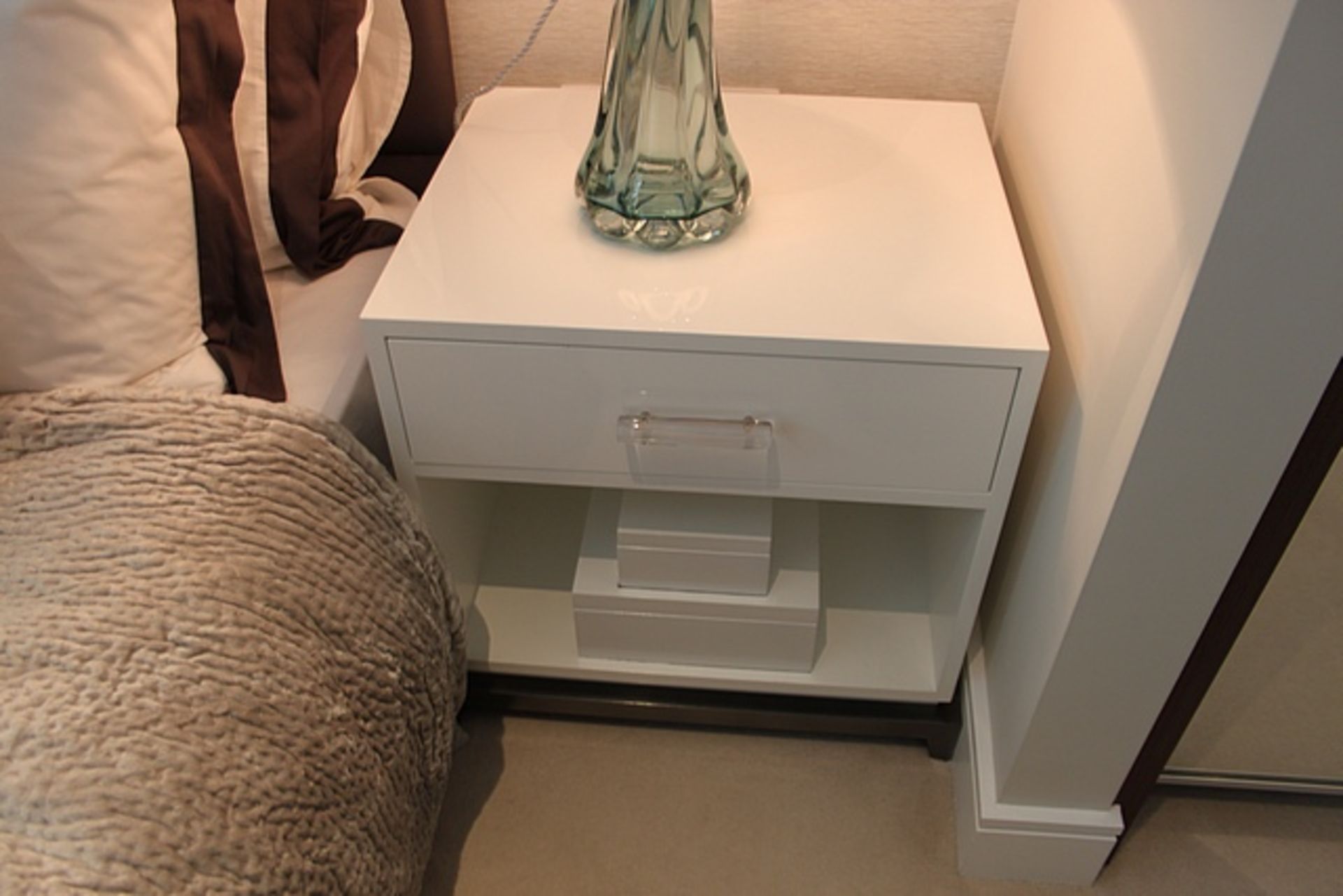 A pair of high gloss single drawer nightstands 550mm x 450mm