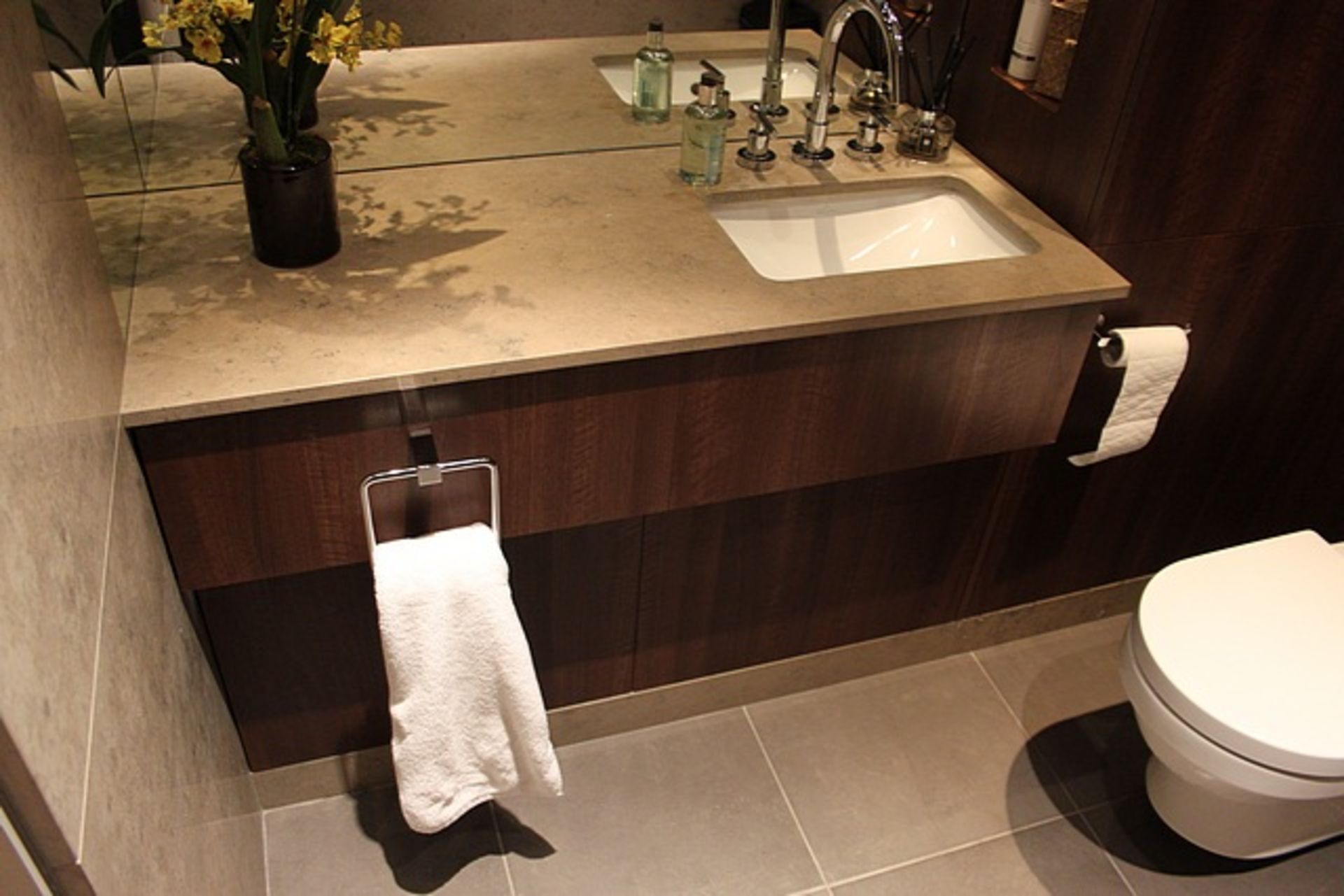 A Villeroy & Boch cloakroom comprising of stone basin and vanity and WC pan 1900mm x 2100mm