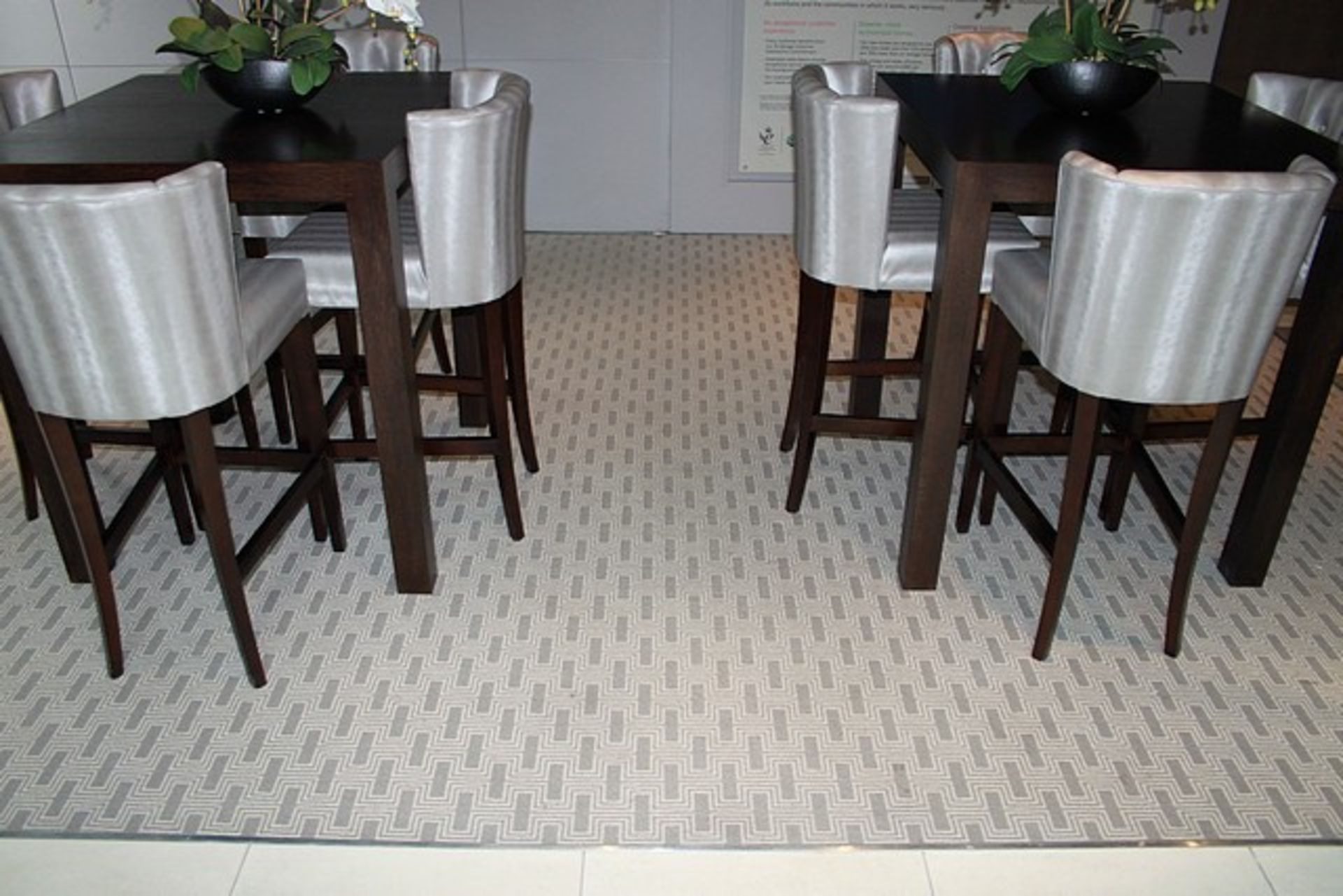 Commercial wool mix carpet in beige and green approximately 5m x 3300mm cut to shape