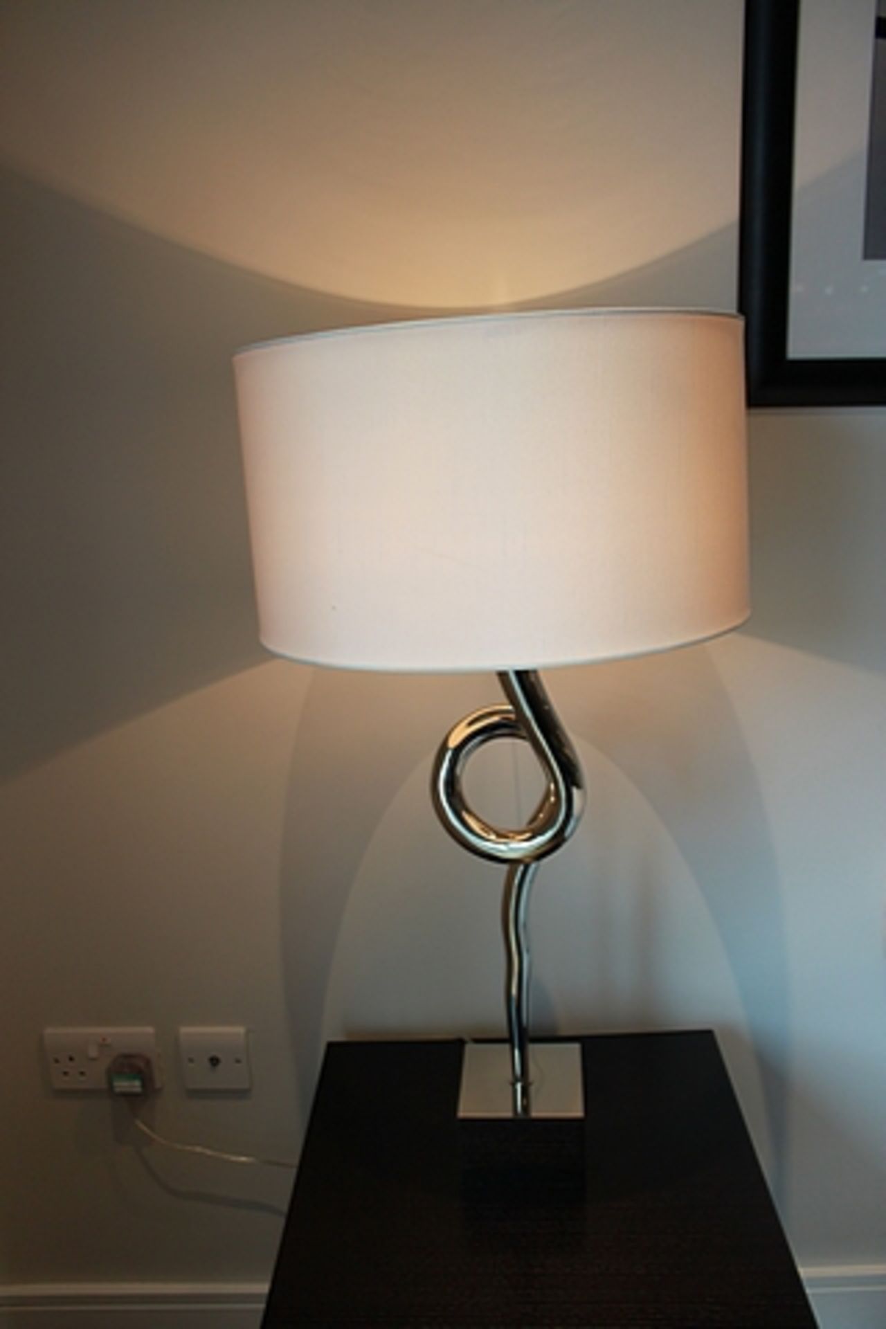 A pair of R V Astley RV ASTLEY Nickel sculptural loop table lamps 790mm tall