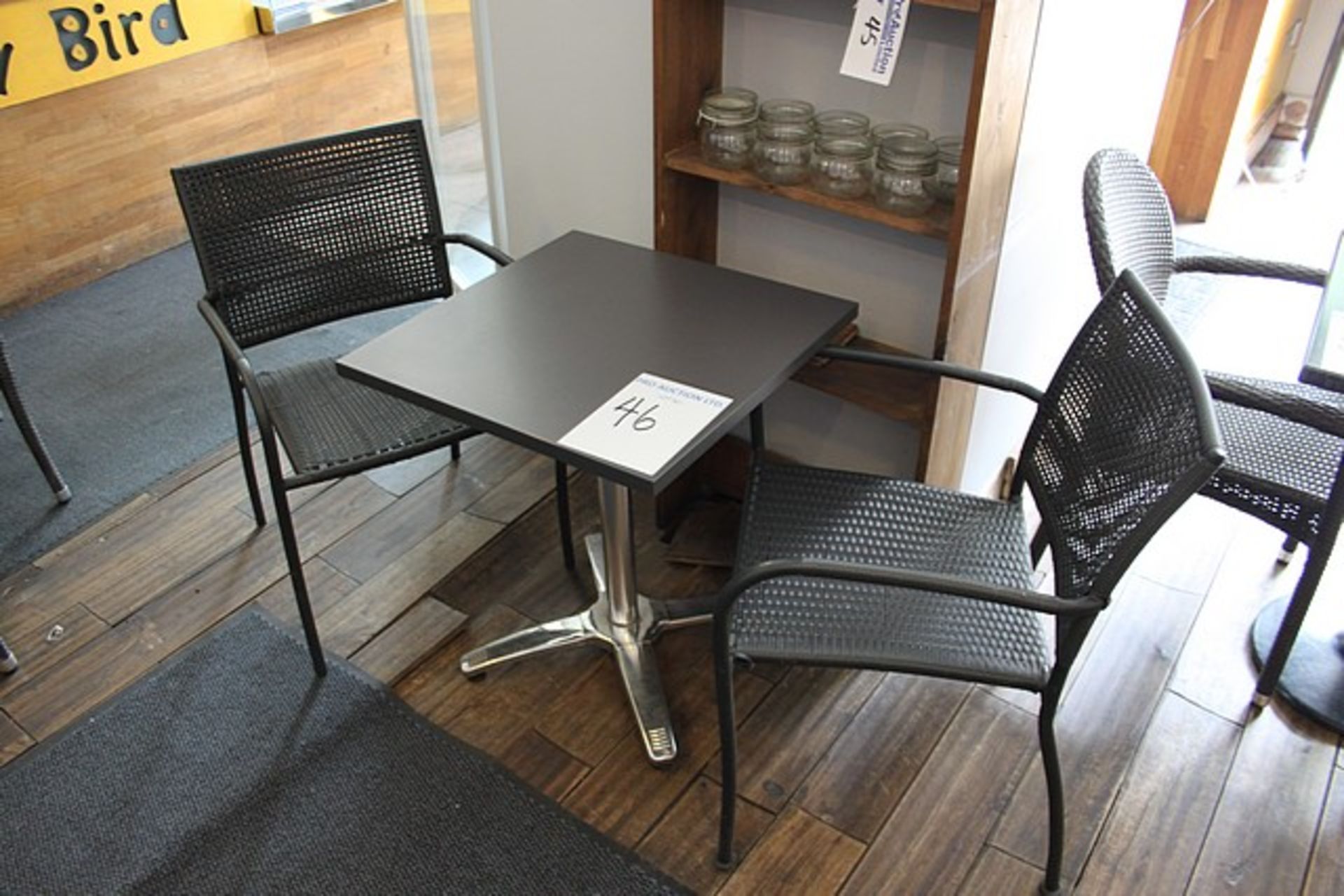 Bistro table with chrome pedestal 600mm x 600mm x 710mm complete with 2 x polyrattan arm chairs