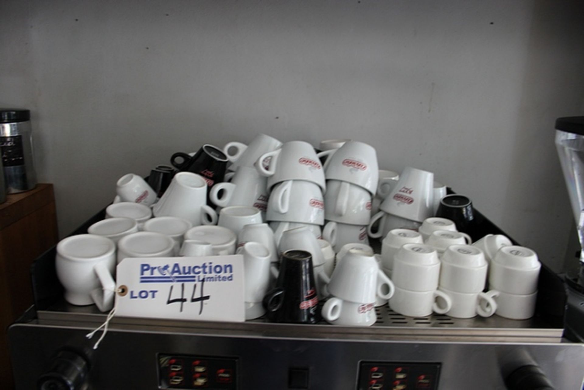 A large quantity of Espress cups, coffee cups, latte glasses, saucer, jugs, teapots and cannisters