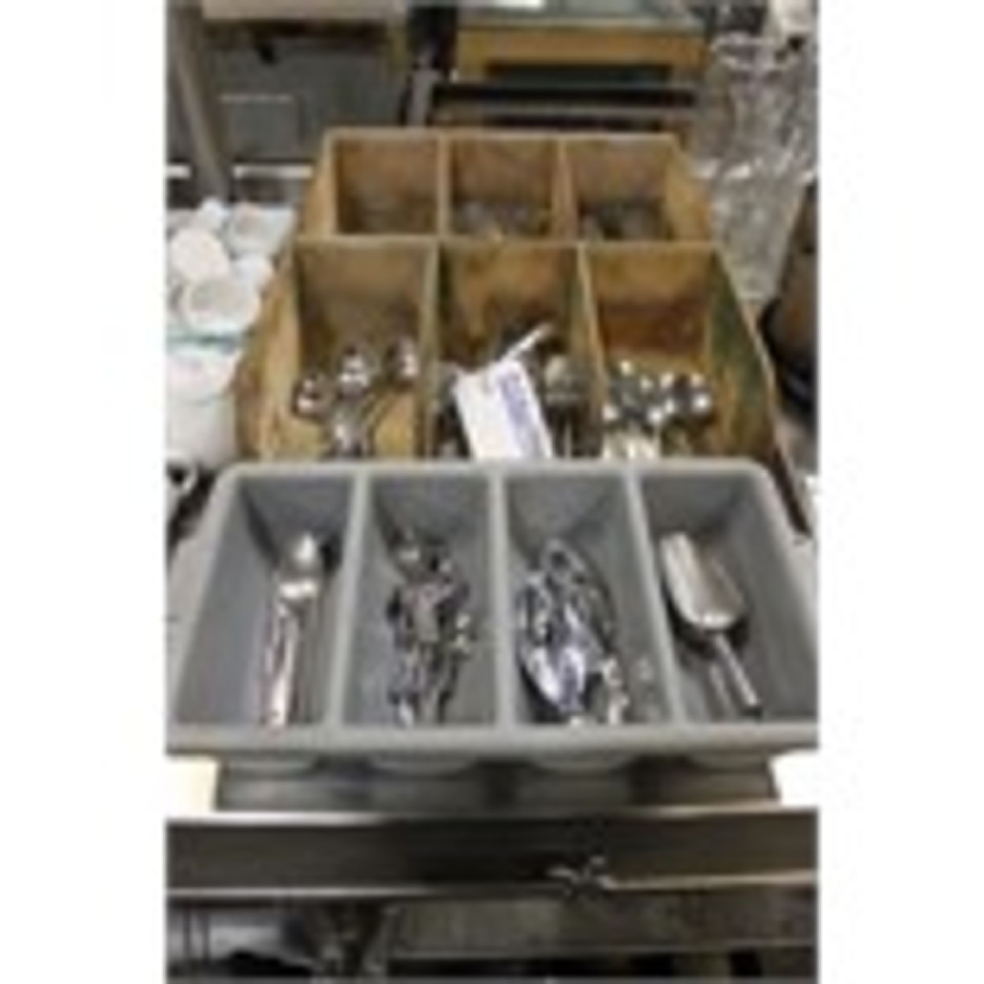 Various stainless steel cutlery as found