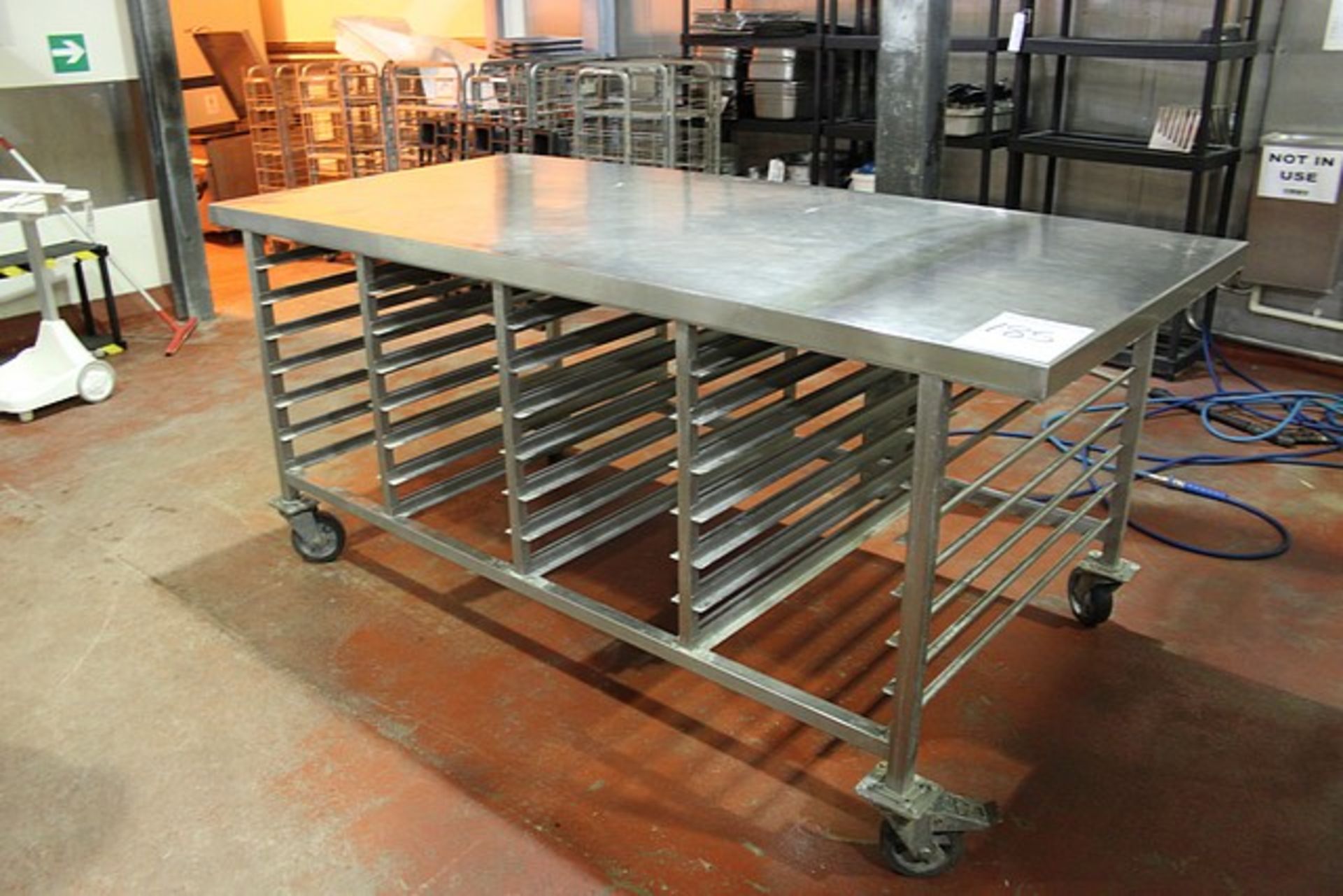 Stainless steel preparation bakery racked table with 28 tray under racking holds 762 x 457mm trays