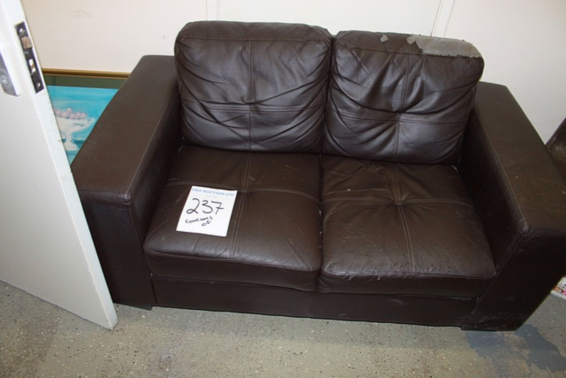 Content of welfare office comprising of two seater sofa, pedal bin, static rack and Beko