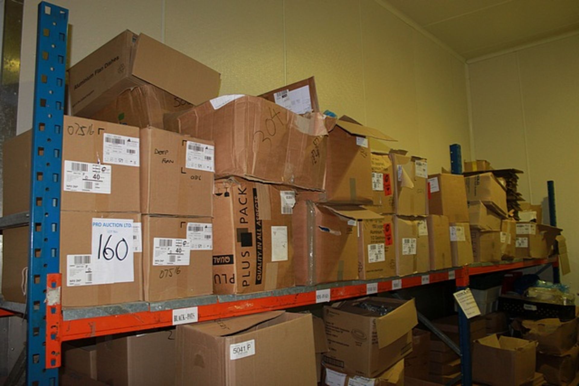A large quantity of packaging materials as found, comprising foils, tins, portion cups and boxes