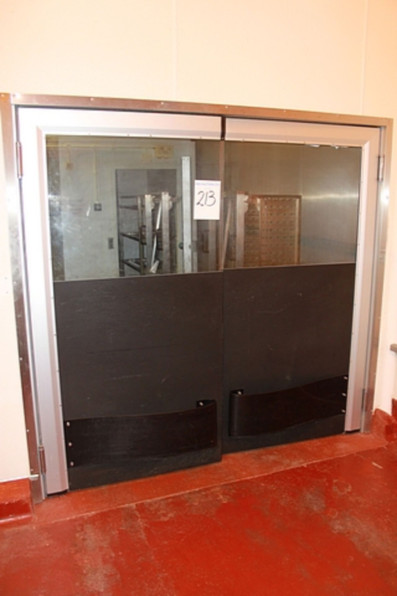 A pair of flexible panels rubber/PVC doors each door 1080mm x 2010mm