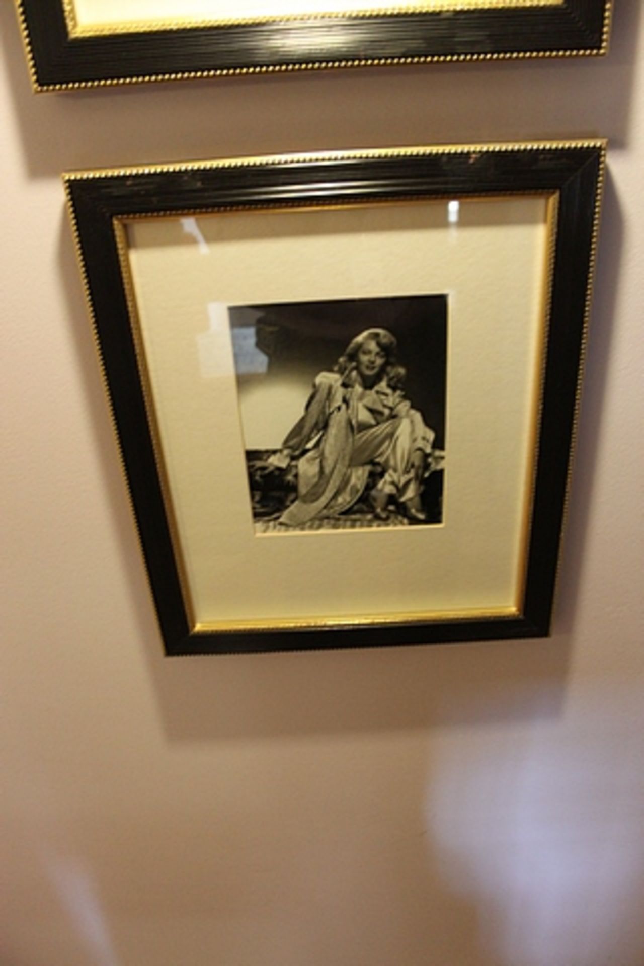 A pair of black and white photoprints, film stars framed 400mm x 480mm with brass picture lamp - Image 2 of 2