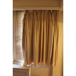 A pair of cream drape curtains spans 2400mm x 1600mm drop