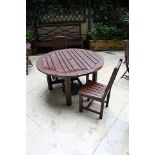 Classically styled 1300mm round stained teak garden table complete with 3 chairs all stained