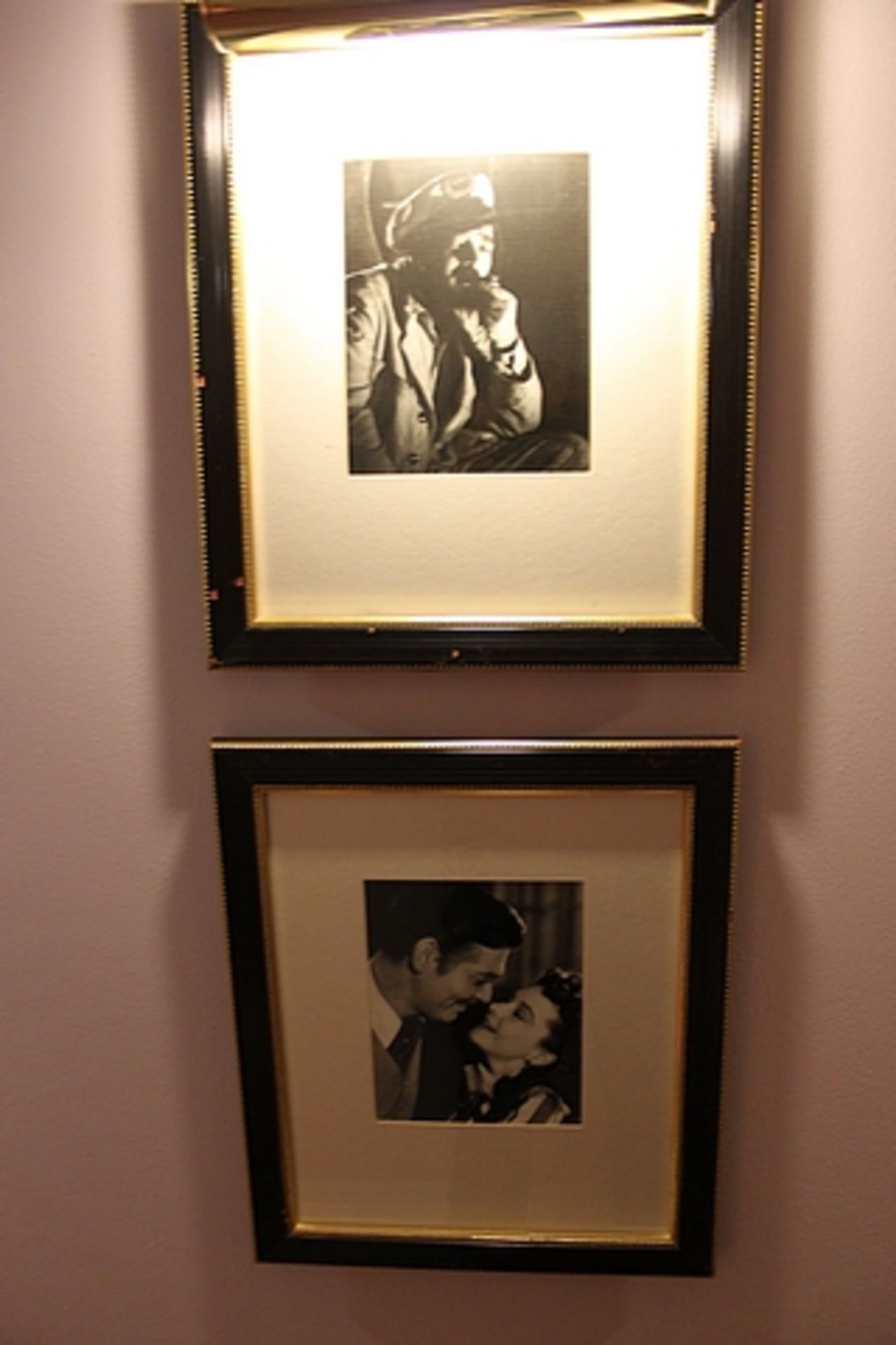 A pair of black and white photoprints, film stars framed 400mm x 475mm with brass picture lamp