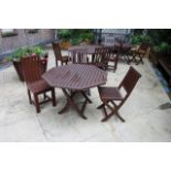 Classically styled 1070mm hexagonal stained teak garden table complete with 3 chairs all stained