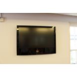 LG wall mounted 42” LG Full HD LED TV