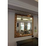 Georgian style gilt framed hanging wall mirror with decorative foliate frame 1080mm x 1090mm