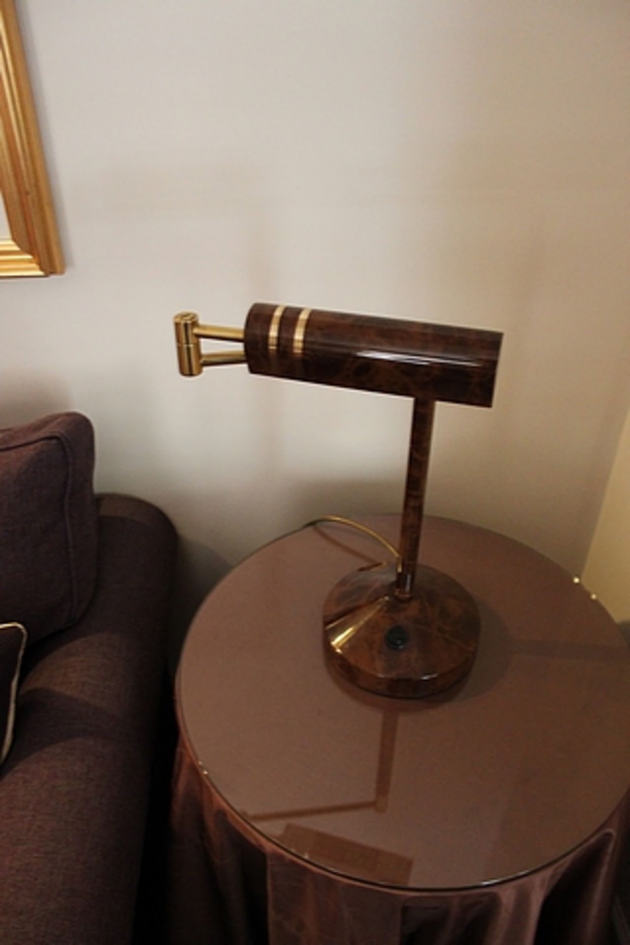 A pair of contemporary arm table lamps in a tortoise shell finish 440mm tall