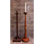 Two Tall Pavement Candlesticks One electric