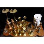 Assorted small candlesticks and candle wax catchers