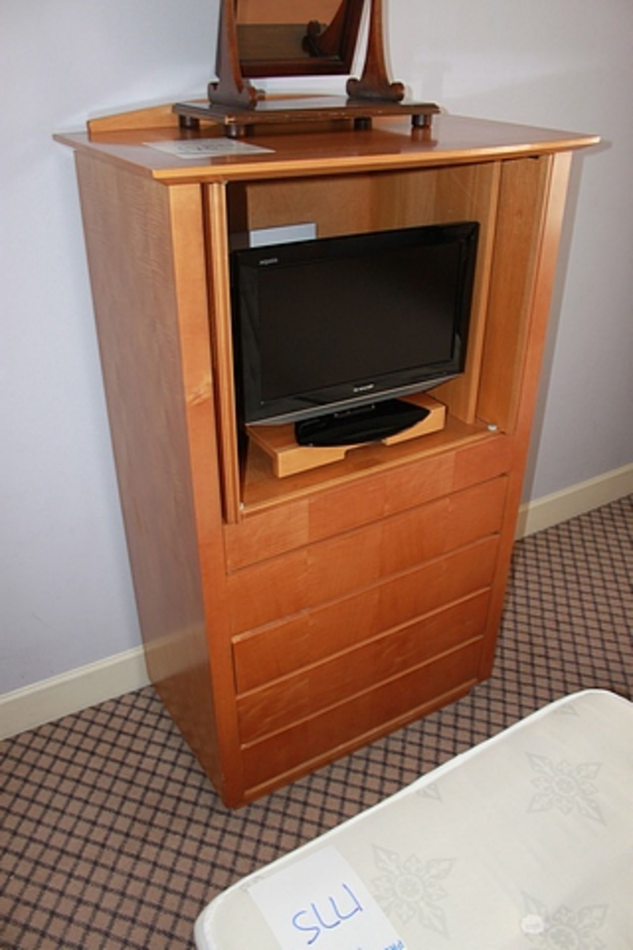 A five drawer chest with two door TV cabinet top complete with Sharp LC20AD5E - 20" Widescreen HD