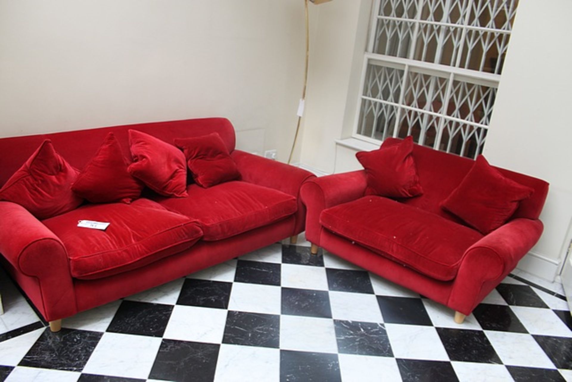 2 x plush velveteen red low back sofas on wooden frame 1 x 1800mm x 1050mm and 1 x 1400mm x 1100mm