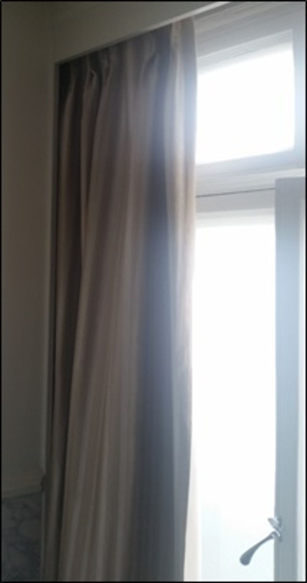 A single drape lined curtain panel Room107Lift out charge 5