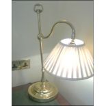 A brass swing arm table lamp Room107Lift out charge 5