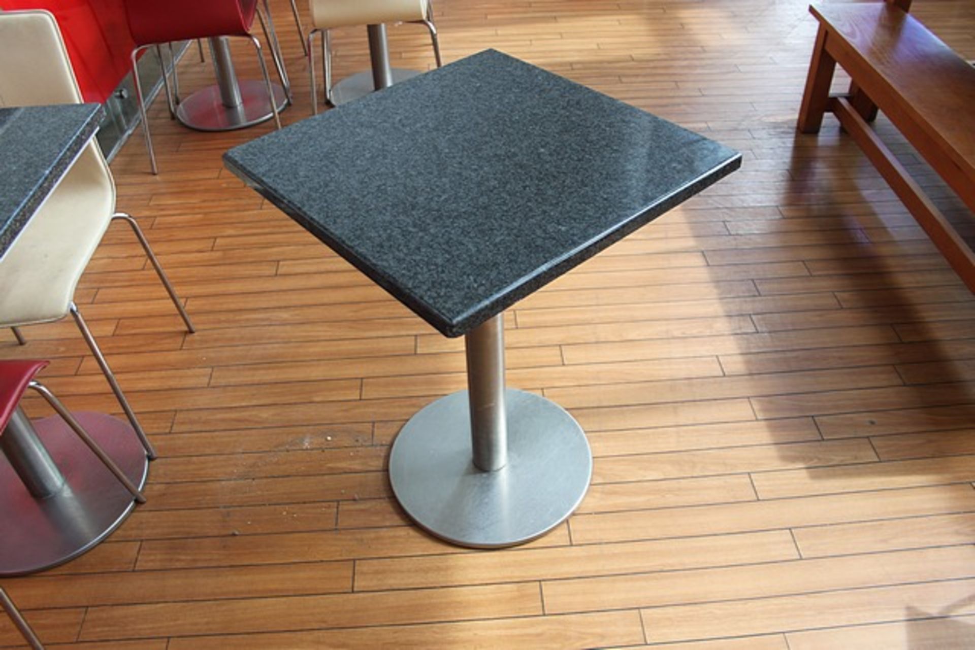 2 x Granite stone restaurant tables 600mm x 600mm on steel pedestal base 790mm tall