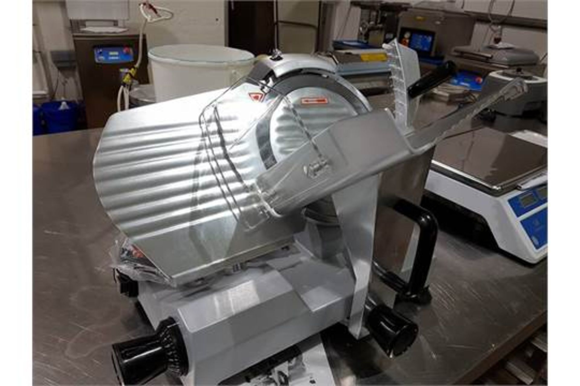 Gravity 220S Automatic Meat Slicer - a high quality gravity feed slicer with a chromed steel blade