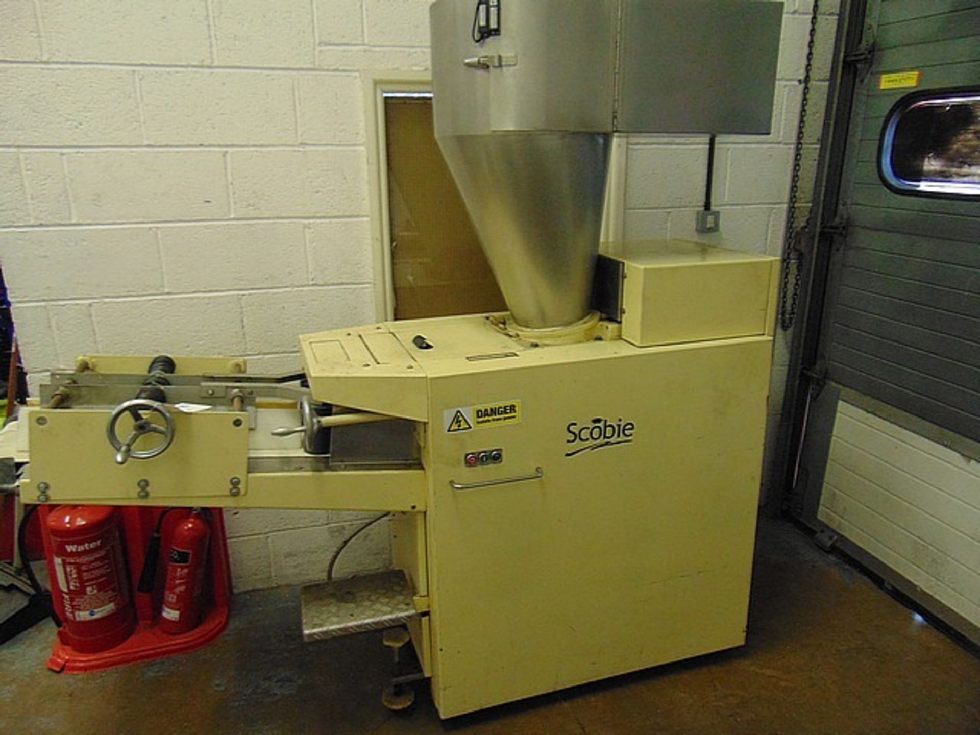 Scobie volumetric divider scobie