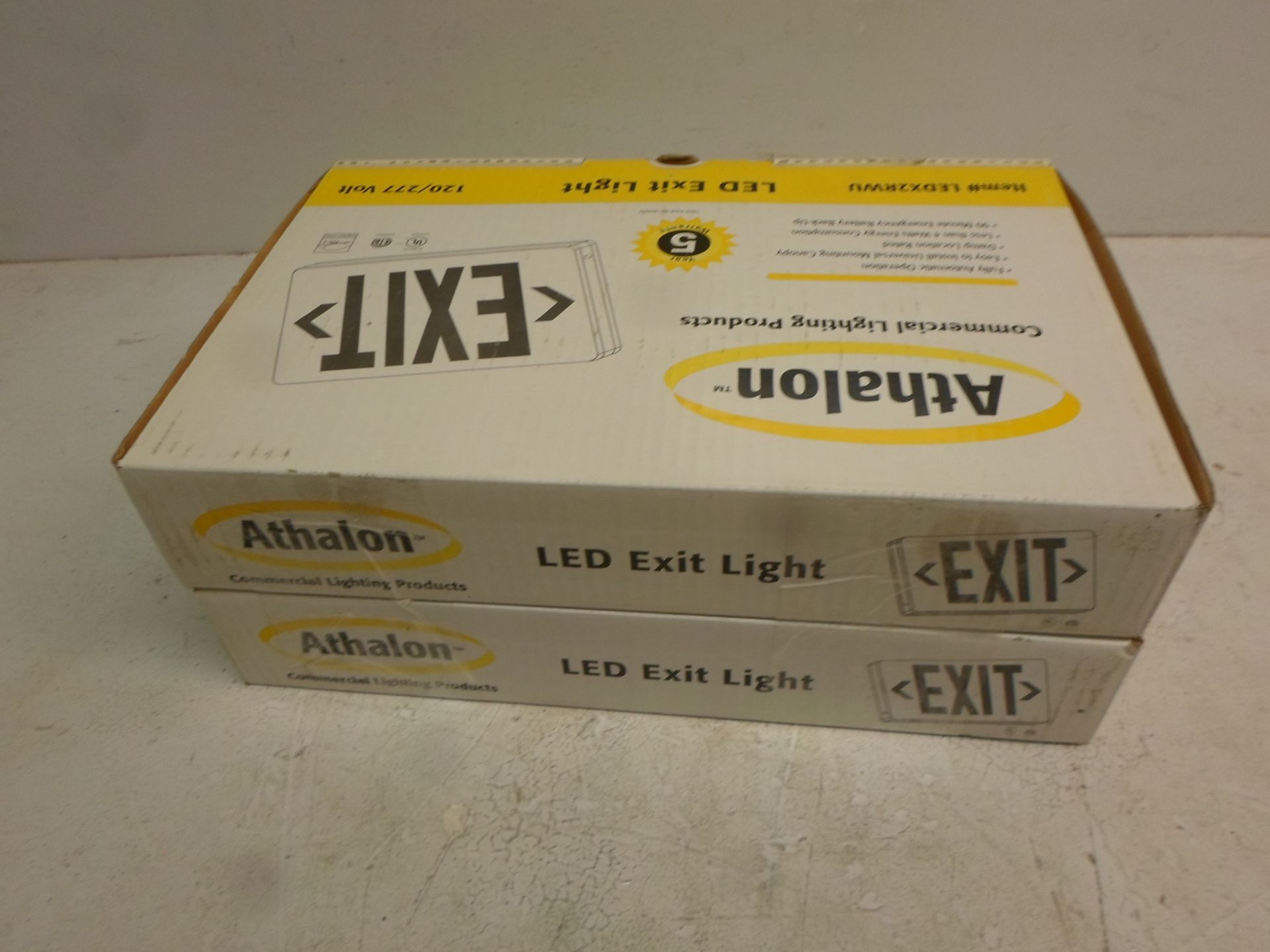 LOT OF TWO NEW ATHALON EXIT SIGNS