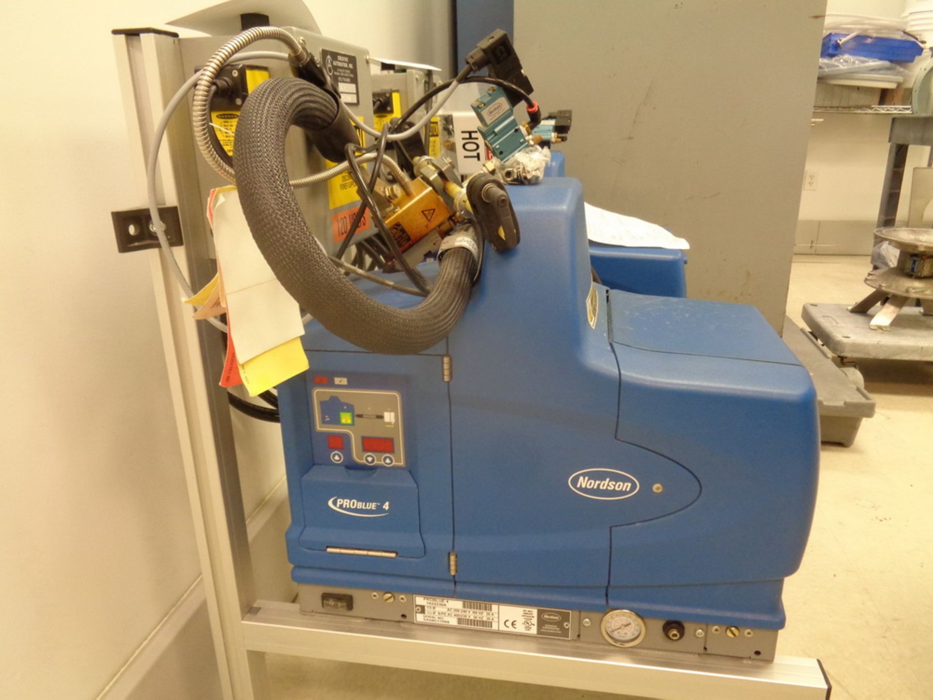 NORDSON HOT GLUE SYSTEM, MODEL PROBLUE 4, SERIAL NUMBER SA04G11069. WITH CREATIVE AUTOMATION CONTROL