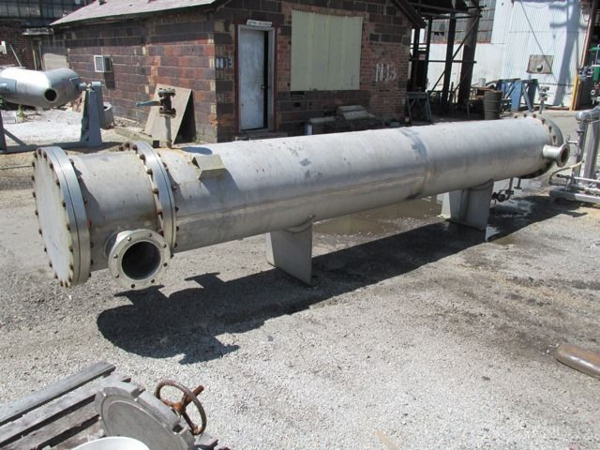 1424 sq ft Doyle & Roth shell and tube heat exchanger, 304 stainless steel.