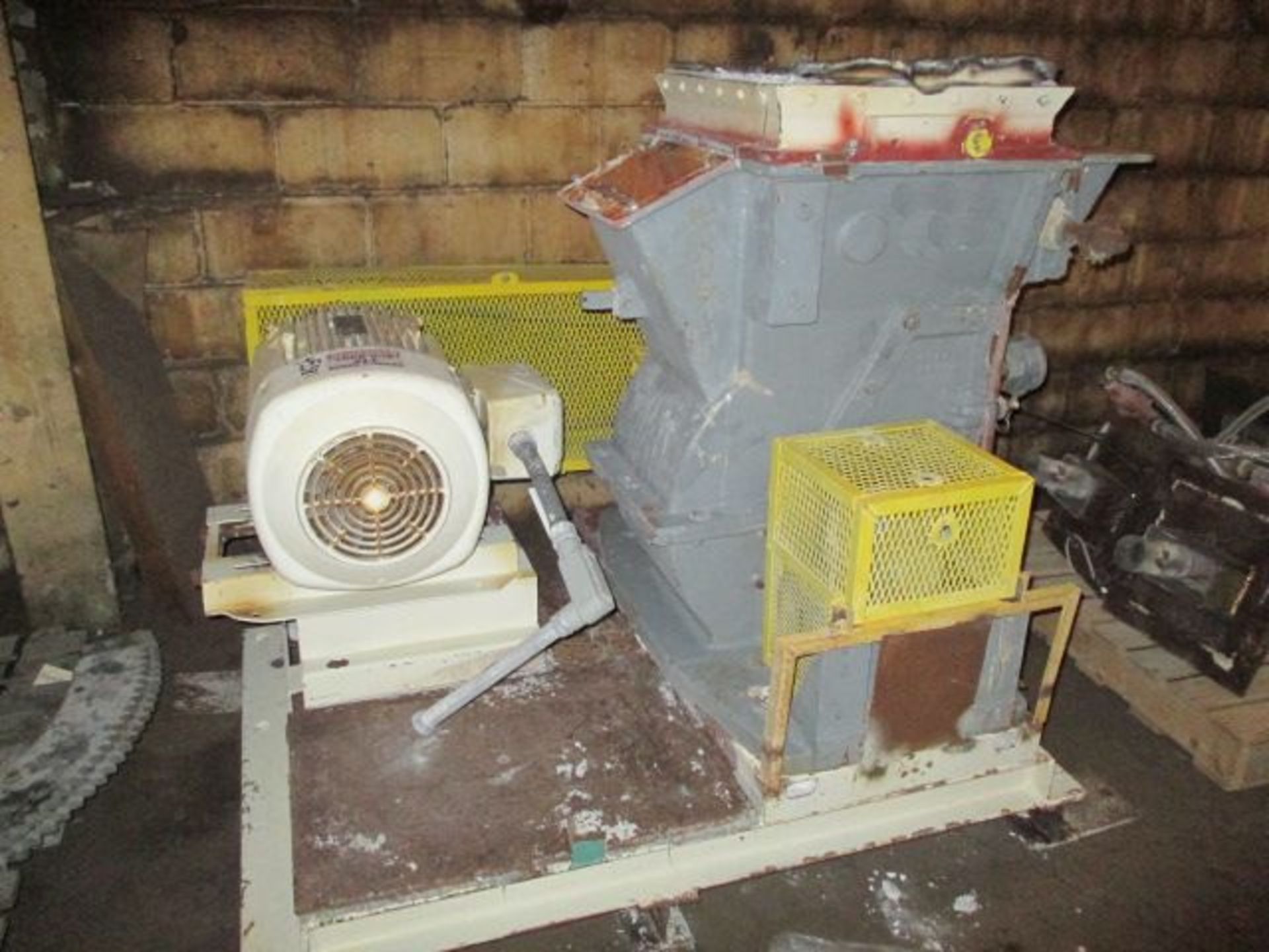 Raymond hammer mill, carbon steel construction, 12" x 15" feed throat, on base with 40 hp, motor.