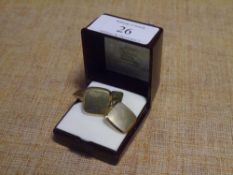 A pair of 14ct gold cufflinks, square and engine turned on a fixed arm 9.5 grams