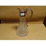 A silver-plate mounted cut-glass claret jug, with leaf-capped scroll handle and tapering cylindrical