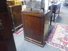 A 19th century estate office cupboard, of plain rectangular form, with single panelled door